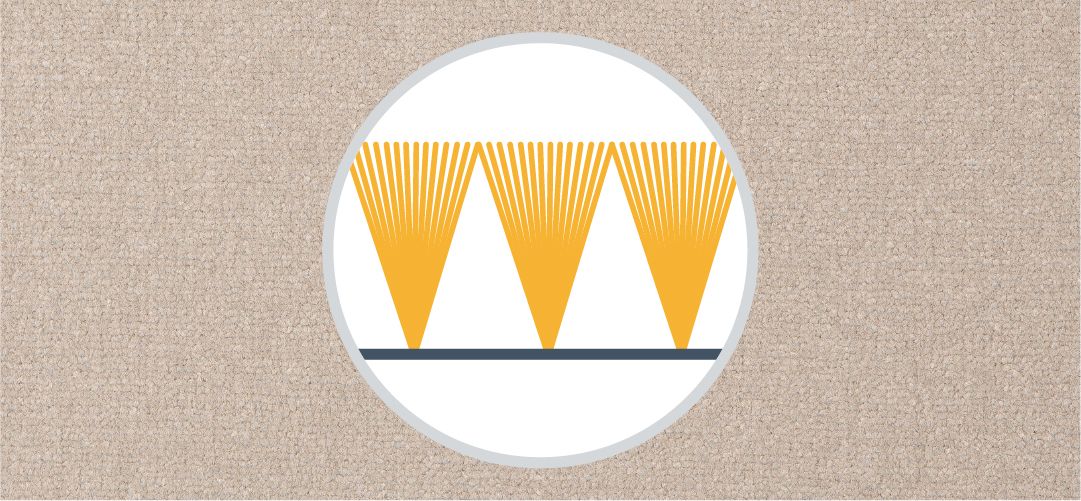 Cross section of cut yarns in a velvet carpet on a neutral carpet background